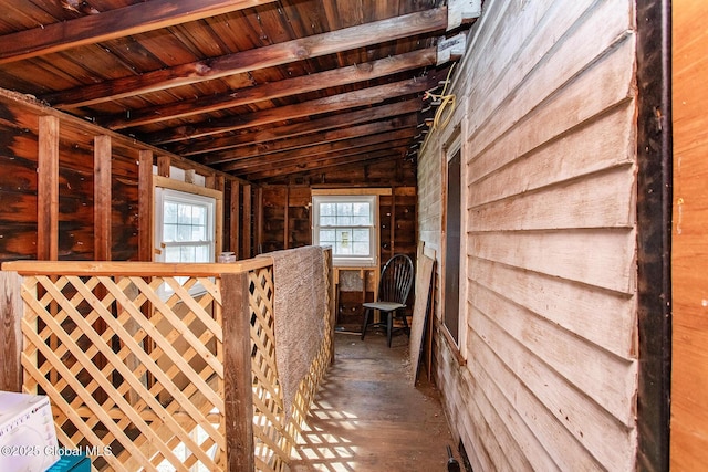 miscellaneous room with beam ceiling and wooden ceiling