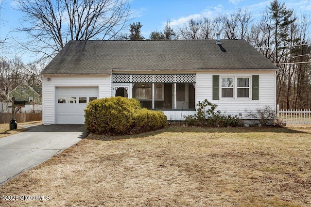 single story home featuring a garage, roof with shingles, fence, and concrete driveway