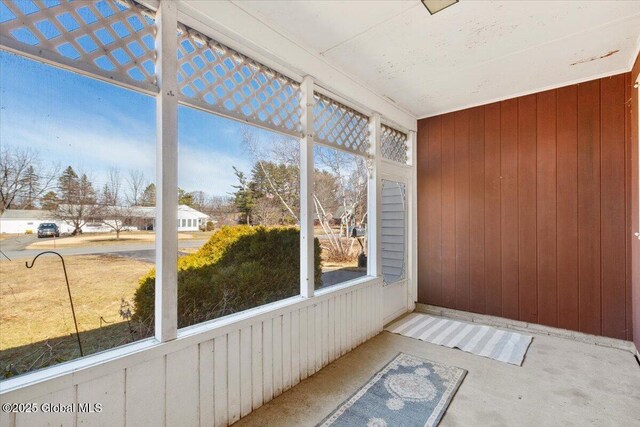 unfurnished sunroom featuring a healthy amount of sunlight