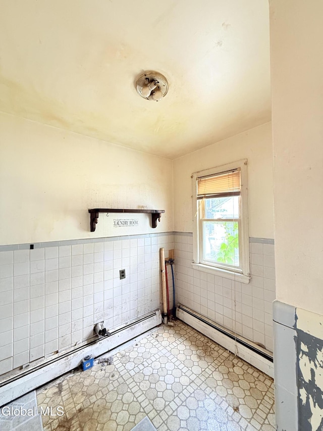 3144 N Thompson St, Rotterdam, NY 12306 - washroom with tile walls, baseboard heating, and wainscoting