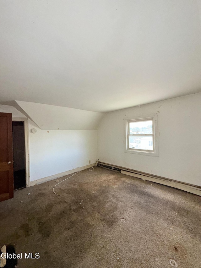 3144 N Thompson St, Rotterdam, NY 12306 - additional living space with vaulted ceiling, carpet floors, and a baseboard radiator