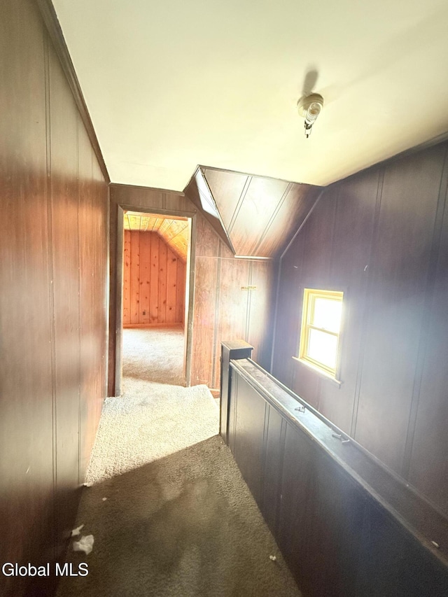3144 N Thompson St, Rotterdam, NY 12306 - additional living space featuring carpet, vaulted ceiling, and wood walls
