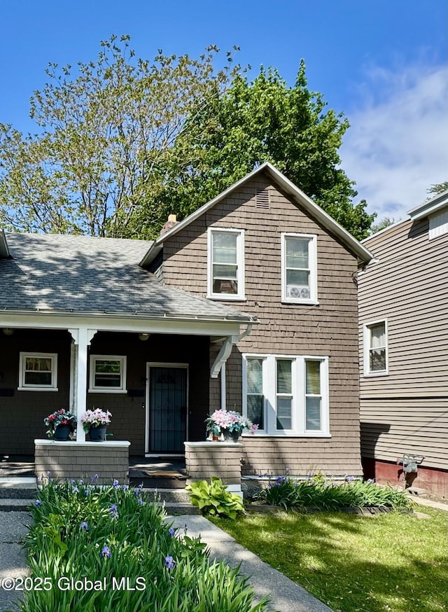 19 Bonheim St, Albany, NY 12204 - view of front of home featuring roof with shingles and covered porch