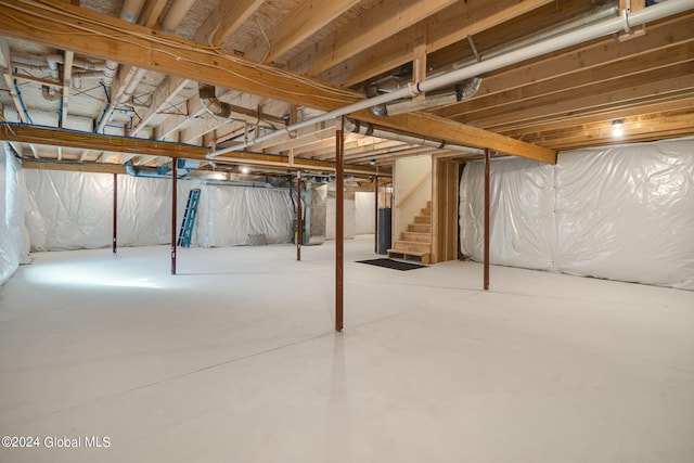 unfinished basement with stairs