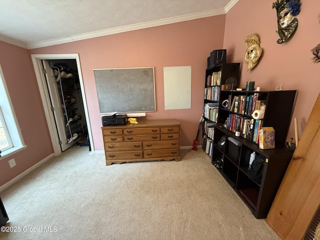 living area with carpet, baseboards, and ornamental molding