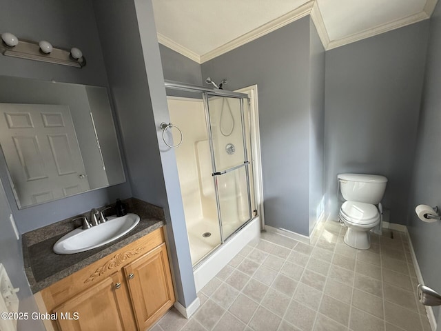 bathroom featuring vanity, ornamental molding, tile patterned flooring, a shower stall, and toilet