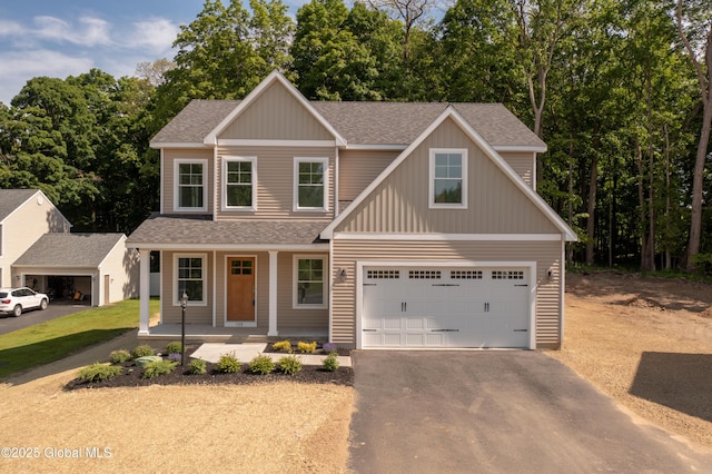159 Anthony Rd, Halfmoon, NY 12065 - view of front of home with driveway, a shingled roof, a porch, and board and batten siding