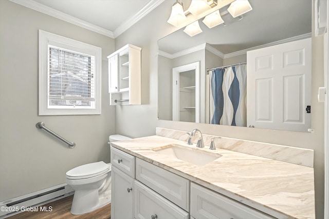 bathroom with toilet, ornamental molding, baseboard heating, wood finished floors, and vanity