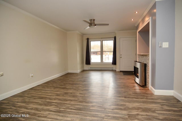 unfurnished living room featuring dark wood-type flooring, crown molding, a lit fireplace, and a baseboard radiator