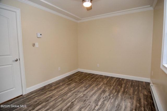 unfurnished room featuring baseboards, baseboard heating, dark wood-style floors, and crown molding