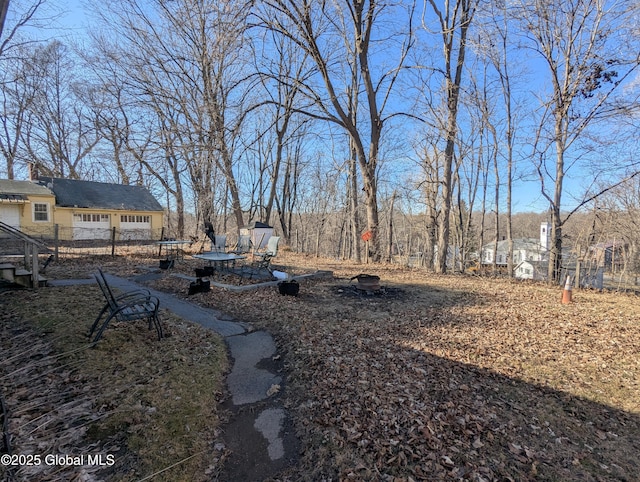 view of yard with a trampoline