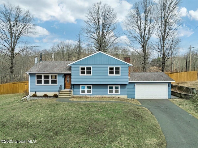 1263 Best Rd, East Greenbush, NY 12061 - split level home featuring driveway, a chimney, a garage, and fence