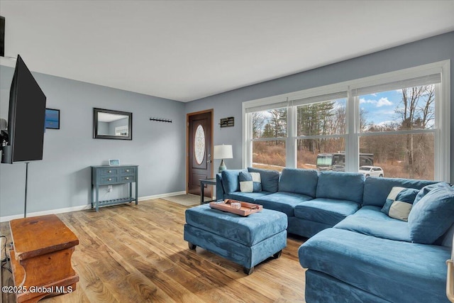1263 Best Rd, East Greenbush, NY 12061 - living area with baseboards and light wood-style floors