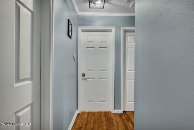 1263 Best Rd, East Greenbush, NY 12061 - hall with baseboards, wood finished floors, and crown molding
