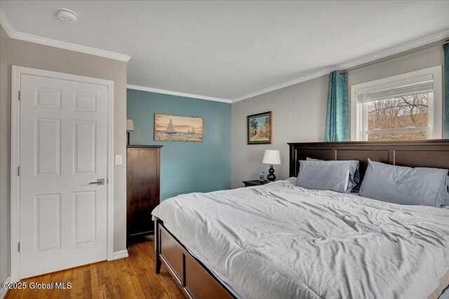 1263 Best Rd, East Greenbush, NY 12061 - bedroom with ornamental molding and wood finished floors