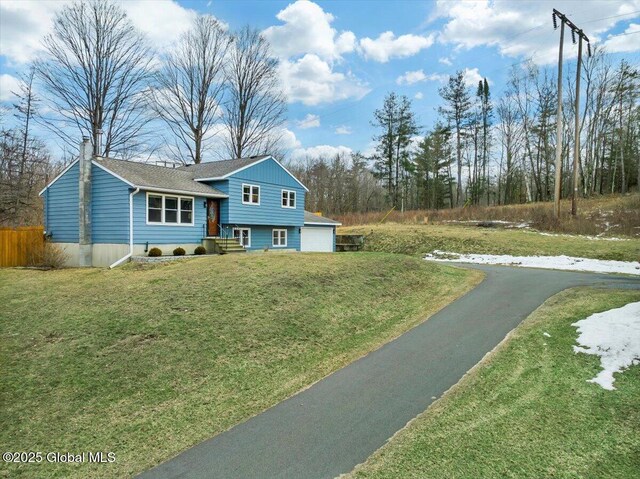 1263 Best Rd, East Greenbush, NY 12061 - split level home with fence, a chimney, a garage, a front yard, and driveway