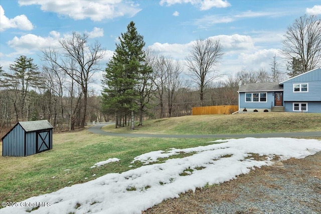 1263 Best Rd, East Greenbush, NY 12061 - view of yard featuring a storage unit, an outbuilding, and fence