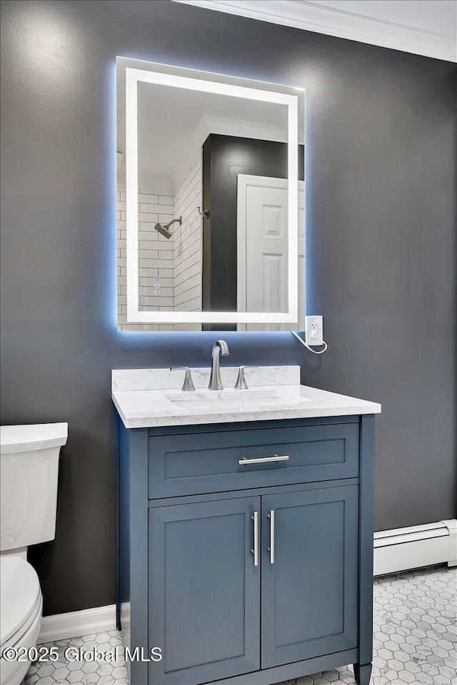 1263 Best Rd, East Greenbush, NY 12061 - full bathroom with tile patterned floors, toilet, vanity, a baseboard radiator, and baseboards