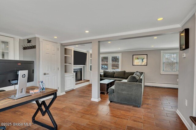 1263 Best Rd, East Greenbush, NY 12061 - living area with crown molding, a fireplace with raised hearth, baseboards, baseboard heating, and wood finished floors