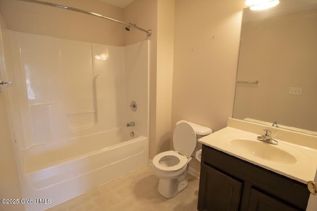 bathroom featuring vanity, shower / bathing tub combination, and toilet