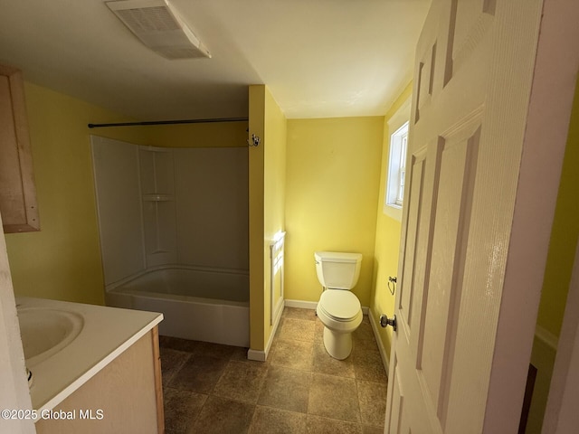 full bath featuring visible vents, toilet, shower / washtub combination, baseboards, and vanity