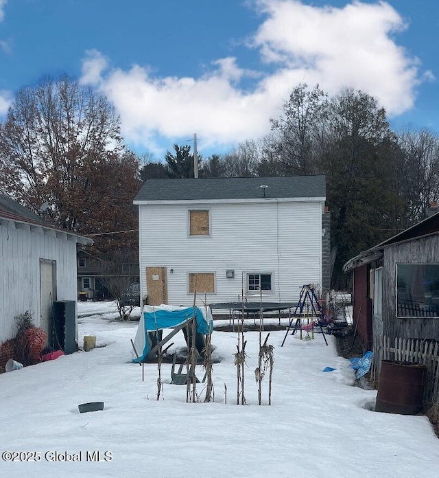 view of snow covered property