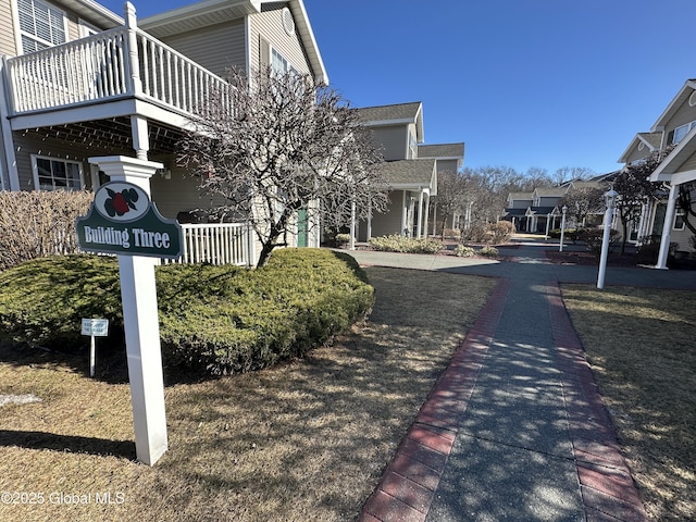 view of road featuring sidewalks and a residential view