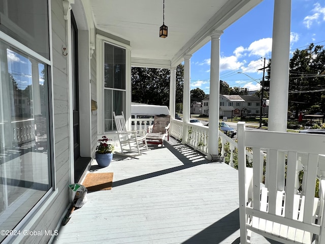 deck with covered porch