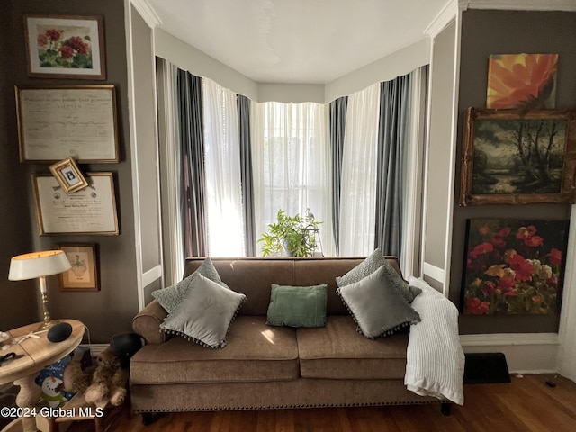 sitting room featuring wood finished floors