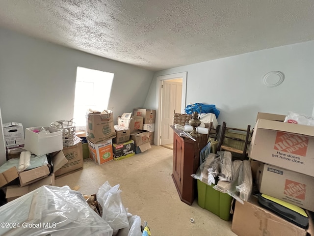 interior space with a textured ceiling