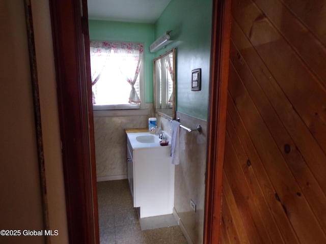 bathroom with tile patterned floors and vanity