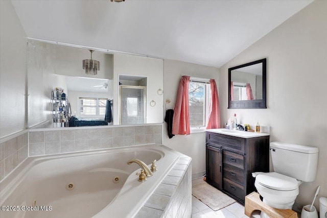 full bathroom featuring vanity, lofted ceiling, a whirlpool tub, a shower stall, and toilet