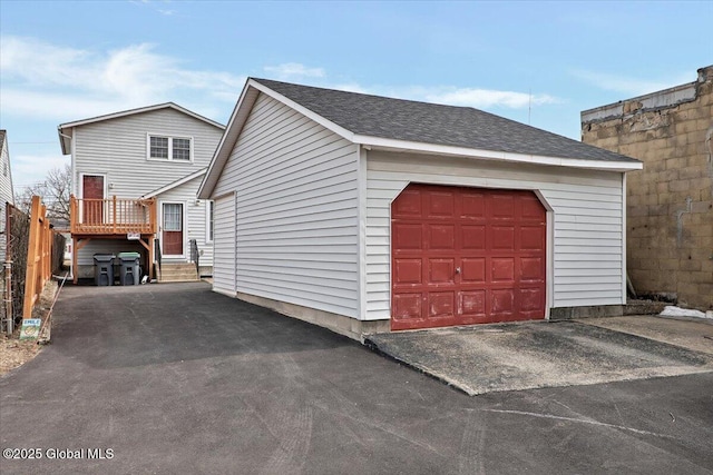 garage featuring fence