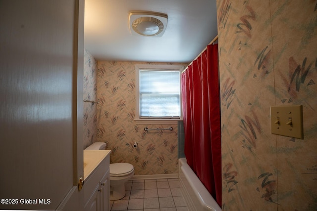 bathroom with vanity, baseboards, wallpapered walls, tile patterned flooring, and toilet