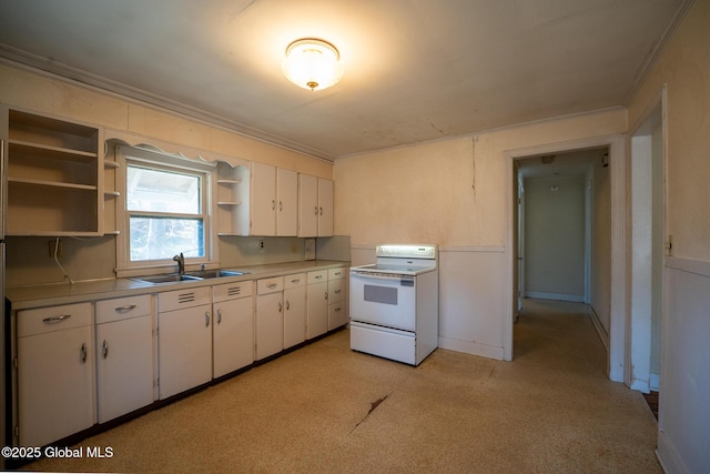 kitchen featuring a sink, white electric stove, crown molding, and open shelves