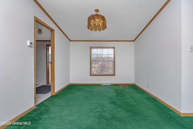 unfurnished room with visible vents, carpet floors, ornamental molding, a textured ceiling, and a chandelier