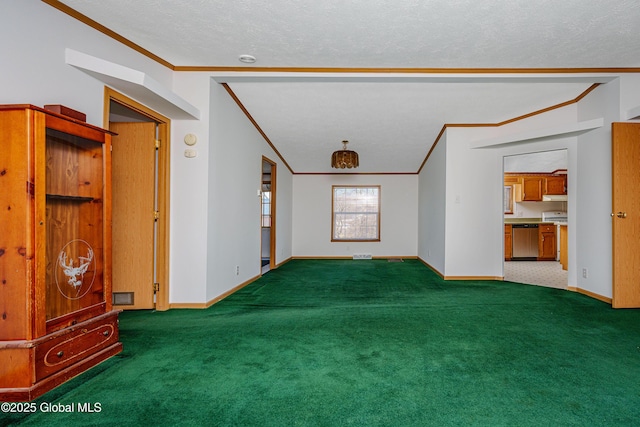 unfurnished living room featuring crown molding, carpet, and baseboards