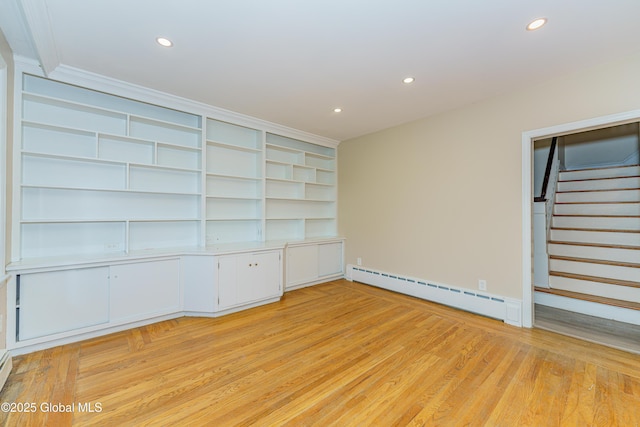 unfurnished bedroom with recessed lighting, light wood-style floors, baseboards, and baseboard heating