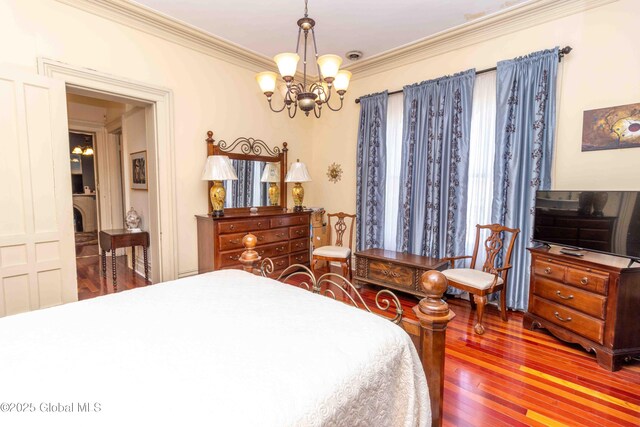 47 Church St, Amsterdam, NY 12010 - bedroom featuring ornamental molding, wood finished floors, and an inviting chandelier