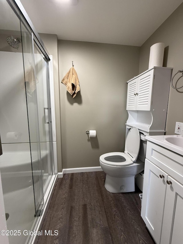 47 Church St, Amsterdam, NY 12010 - full bathroom with toilet, a shower stall, and wood finished floors