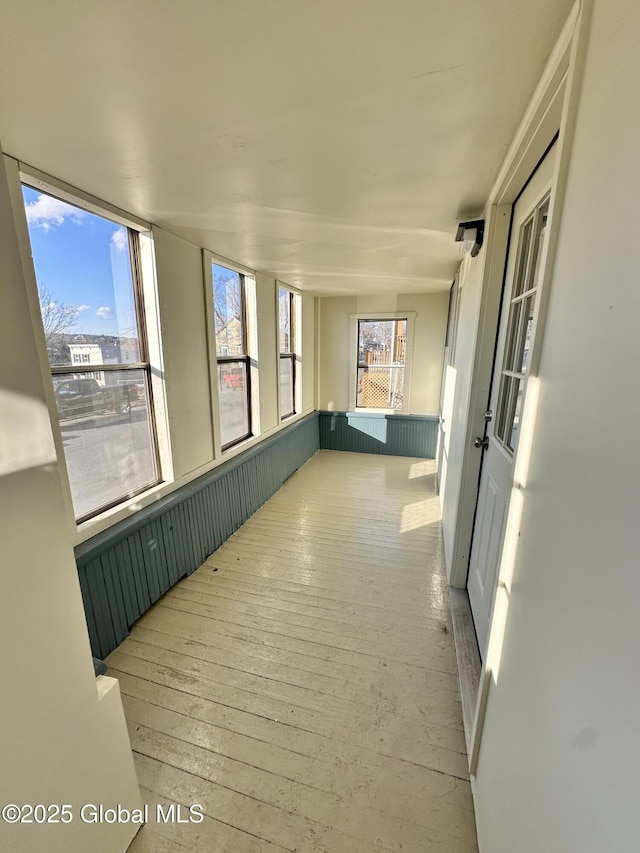 view of unfurnished sunroom