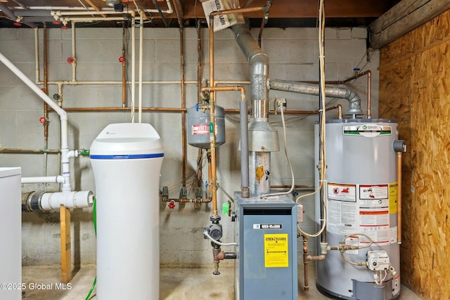 utility room featuring water heater