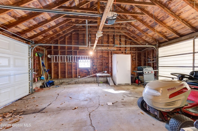 garage with freestanding refrigerator