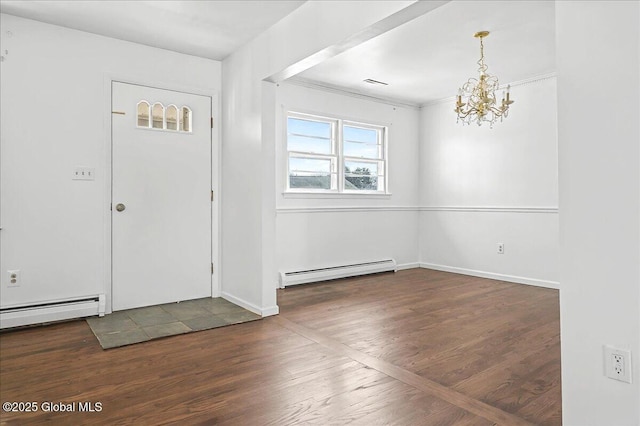 entrance foyer featuring a baseboard radiator, visible vents, wood finished floors, and a chandelier