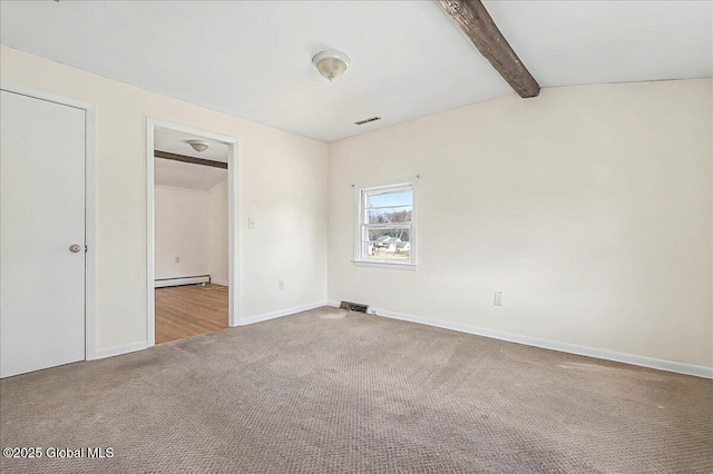 carpeted spare room featuring baseboards, a baseboard heating unit, beam ceiling, and visible vents