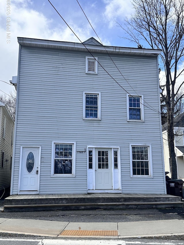 view of front of property featuring a deck