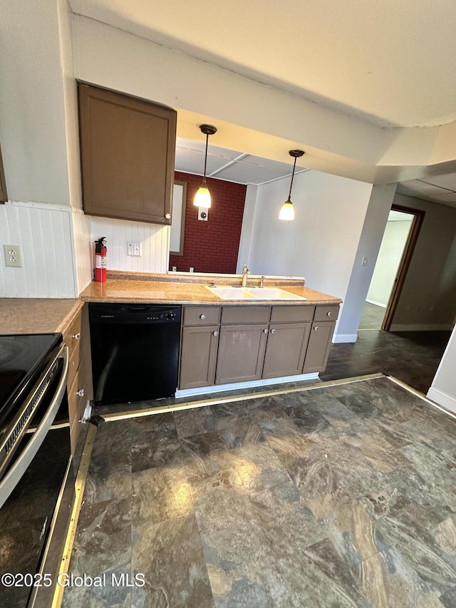 kitchen featuring a sink, decorative light fixtures, stainless steel electric stove, a peninsula, and dishwasher