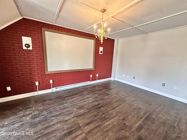 interior space with brick wall, dark wood-type flooring, baseboards, and a baseboard radiator