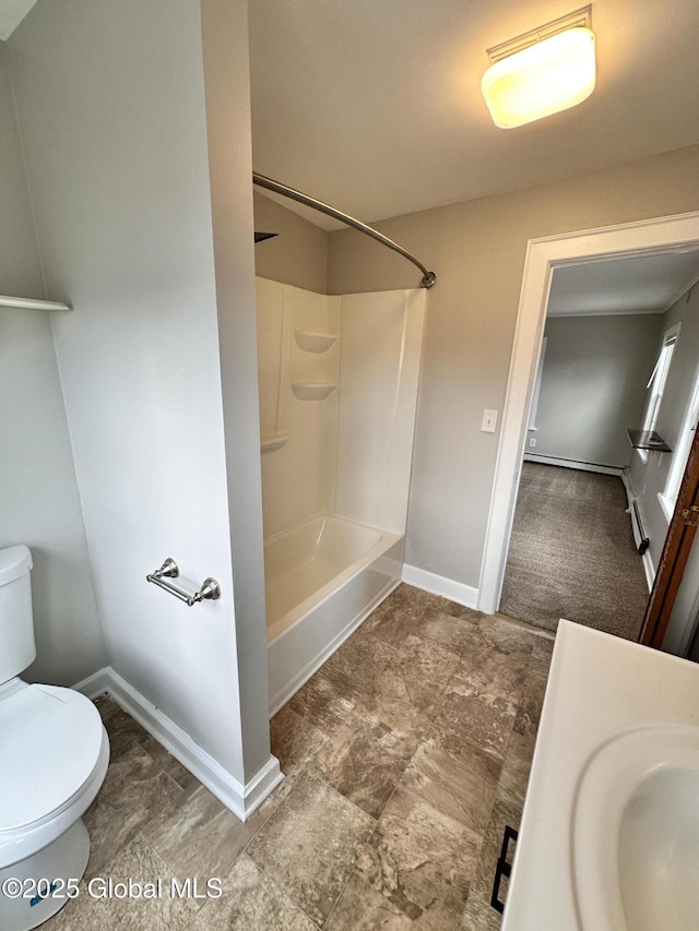 full bath with a baseboard radiator, baseboards, toilet, and shower / tub combination