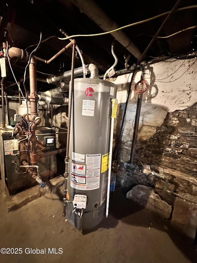 utility room with water heater